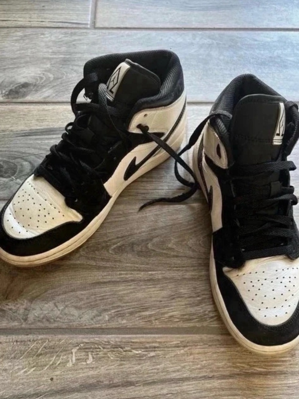 Nike Air Jordan mid Black and White High-Top Sneakers